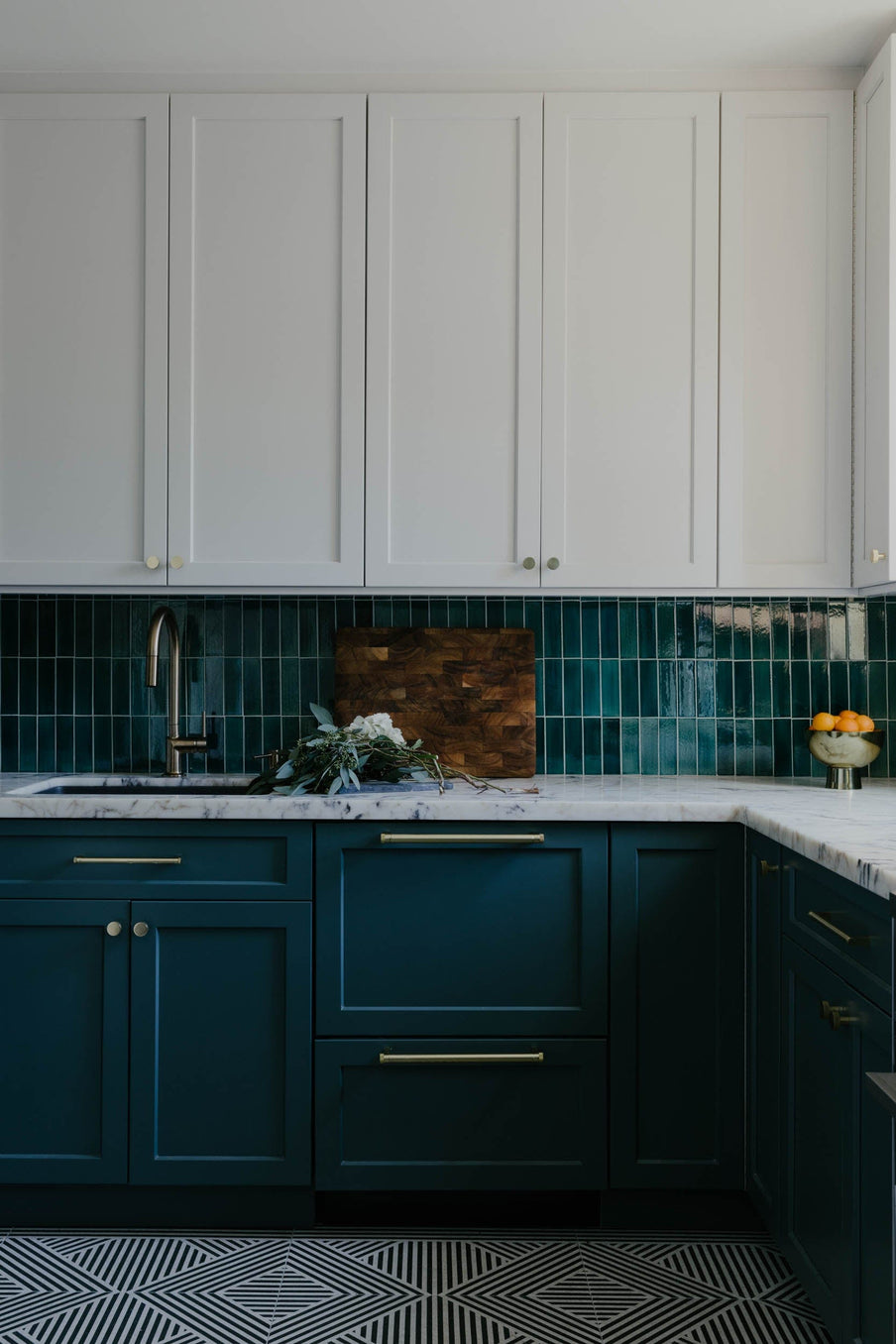 dark teal stacked subway tile kitchen