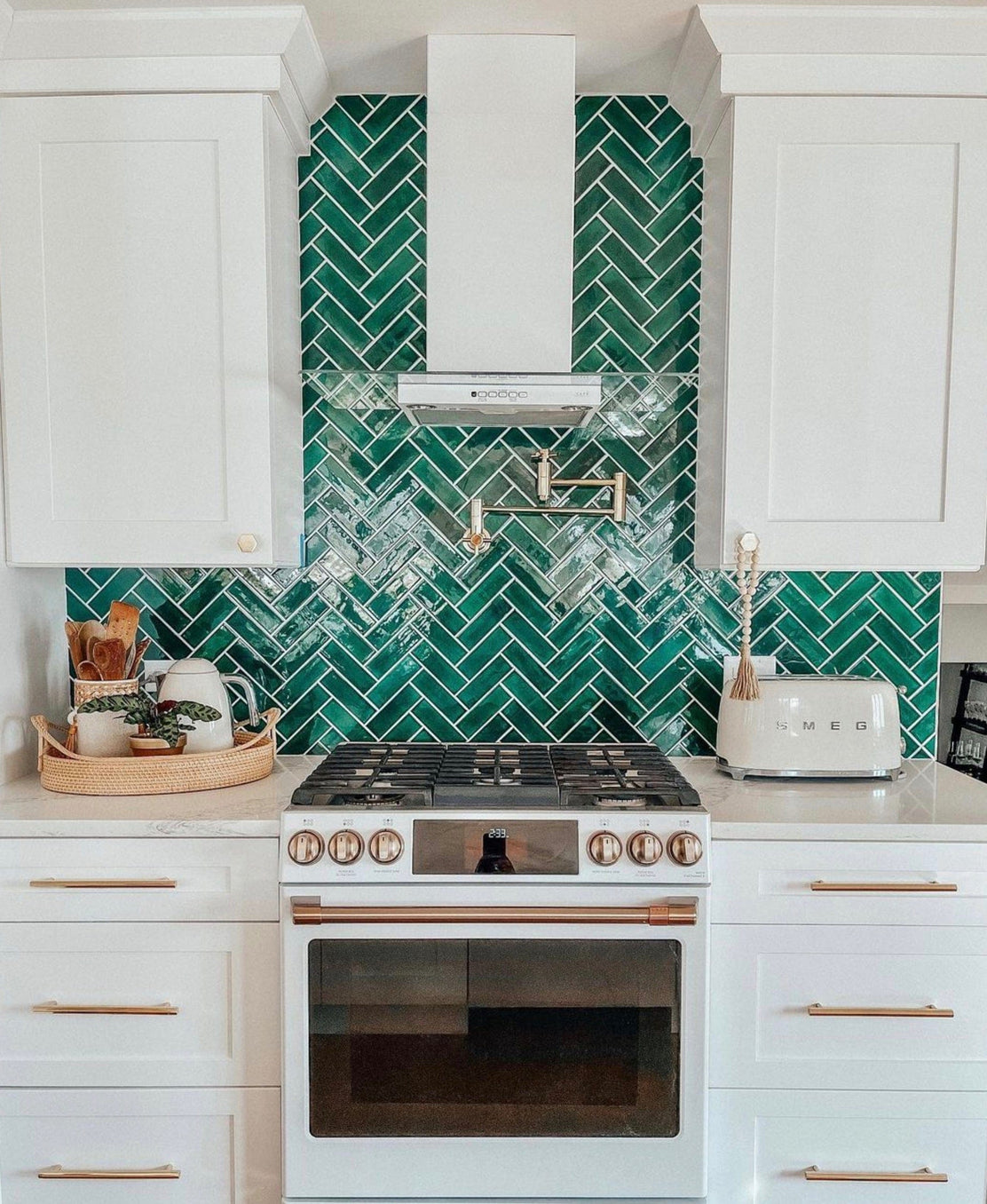 emerald green herringbone tile kitchen backsplash