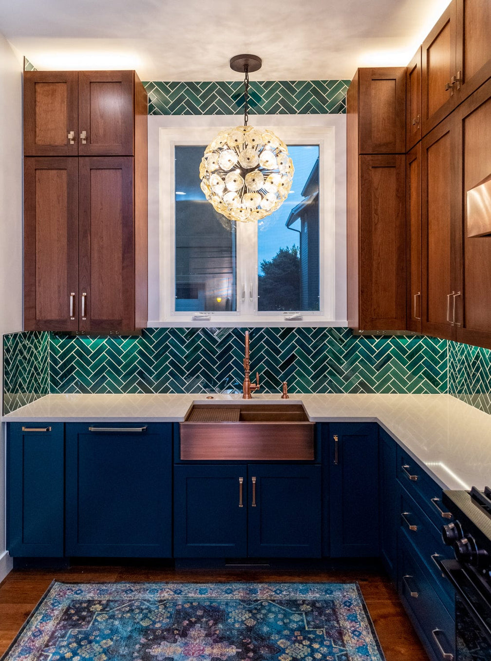 emerald green herringbone tile kitchen backsplash