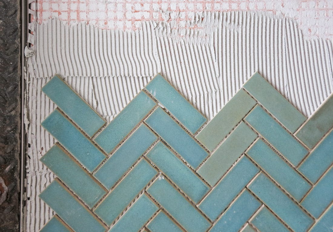 herringbone tile floor