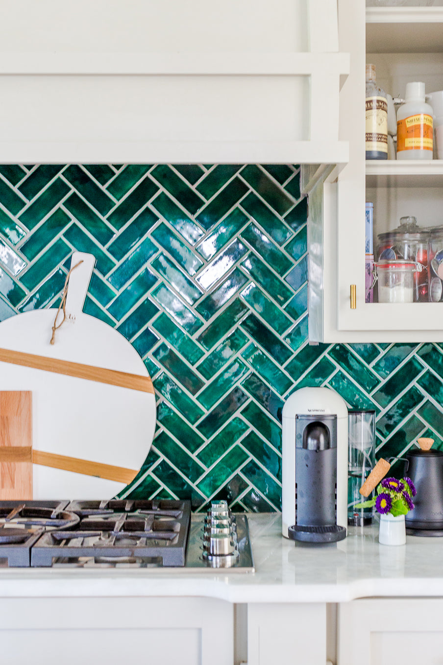 emerald green herringbone tile kitchen backsplash